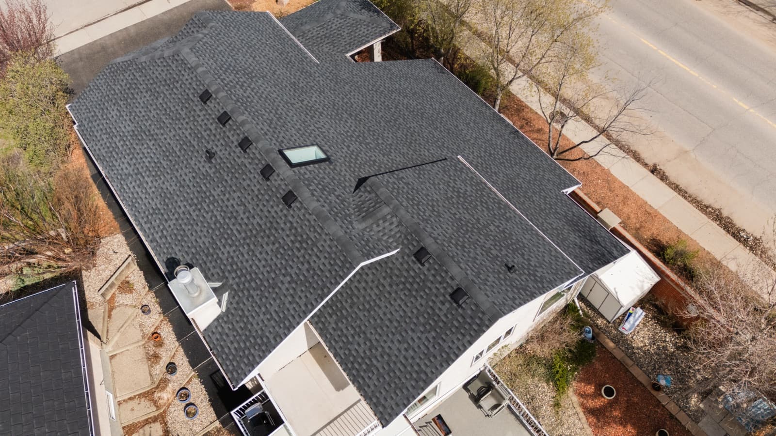 Shingle roofing project from above in Regina